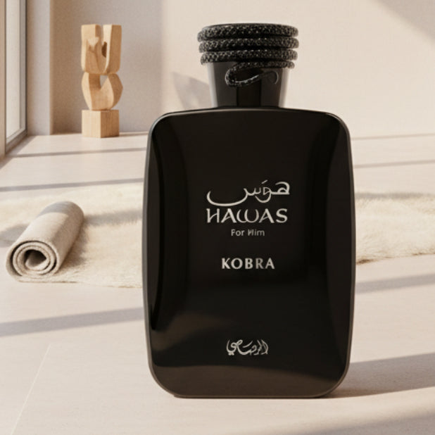 Black perfume bottle labeled 'Hawas Kobra' on a white background