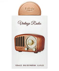 Vintage radio-shaped perfume bottle packaging on a white background